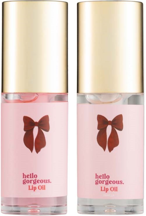 Two lip oil bottles with gold caps, pink labels, and a brown bow design, labeled Hello Gorgeous Lip Oil.