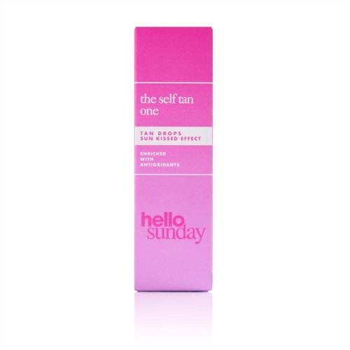 Pink box with text about self-tanning product and healthy ingredients, with a bright, cheerful design.