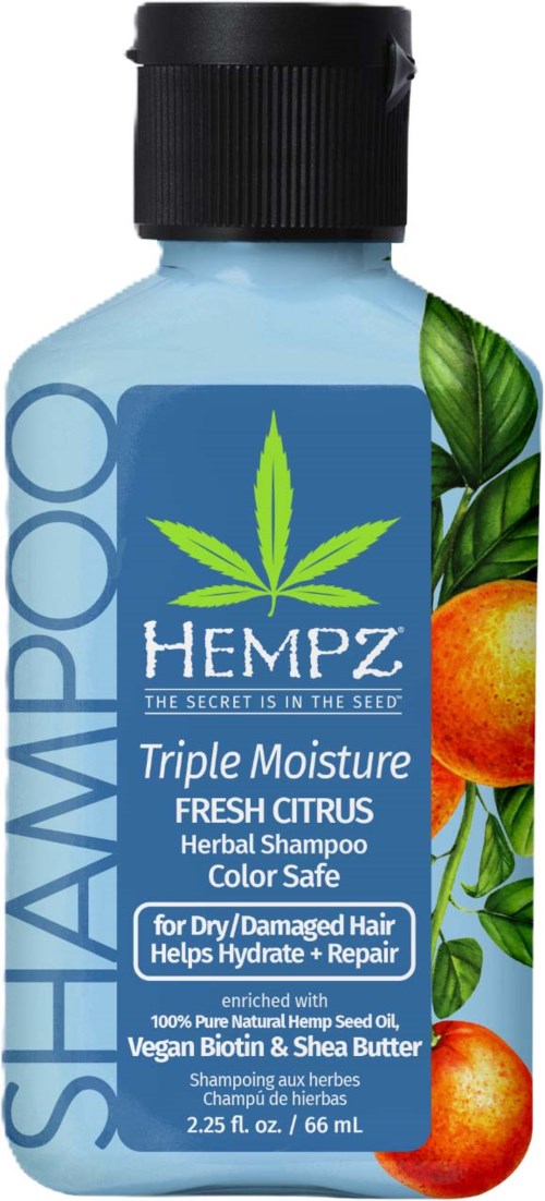 Hempz yrttshampoo, jossa on appelsiini- ja vihreitä sitrushedelmäkuvia, merkattu kosteuttavaksi ja väriä suojaavaksi.