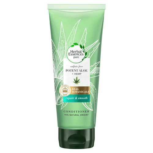En grön conditioner-rör märkt Herbal Essences med aloe och hamp, för reparation och jämnhet, 94% naturligt ursprung.