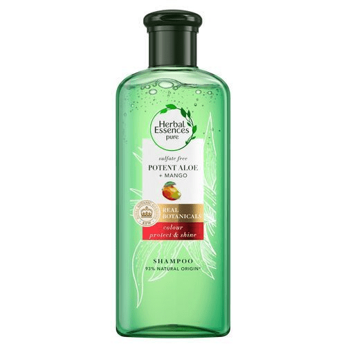 En grønn sjampo-flaske med aloe og mango, merket som herbal, pure og naturlig, for fargebeskyttelse og glans.