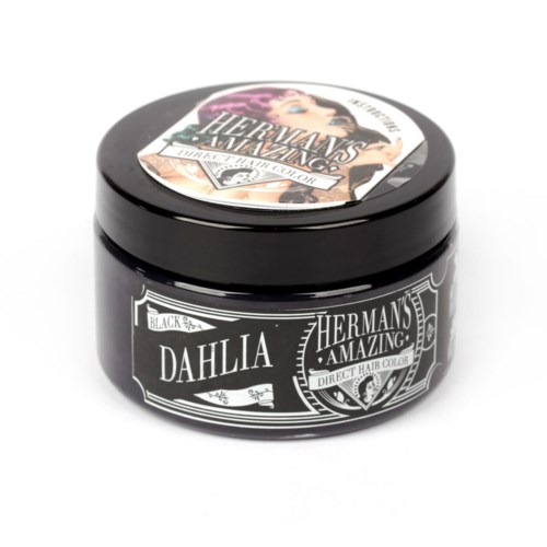 A small black jar labeled 'Dahlia' from 'Hermans Amazing,' likely containing hair color or styling product.