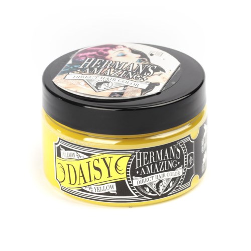 Gelbe Haarfärbe-Dose mit schwarzem Deckel, beschriftet 'Daisy' und 'Herman's Amazing' im Vintage-Stil.