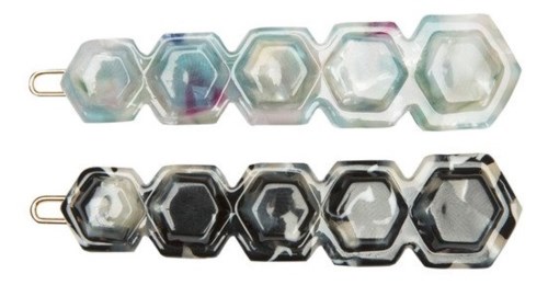 Två set med hårklämmor i hexagonform, en tydlig med färgglada reflektioner, och en svart med glansig yta.