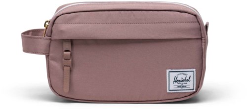 A pink bag with multiple pockets and a handle, made of fabric, and a Herschel logo patch on the front.