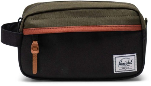 A black and green Herschel bag with a brown zipper and strap, featuring a small logo patch.