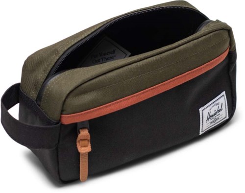 A small bag with black, green, and brown colors, a zipper, and a label.