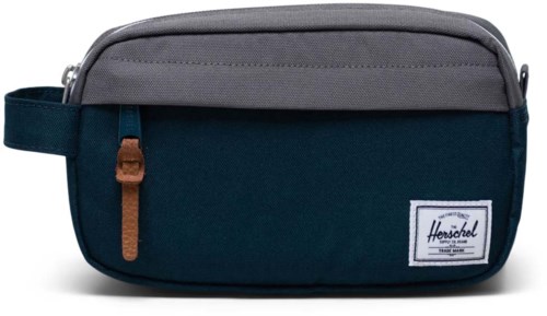 A small, rectangular bag with a zipper, mostly dark blue and gray, with a brown zipper pull and Herschel logo.