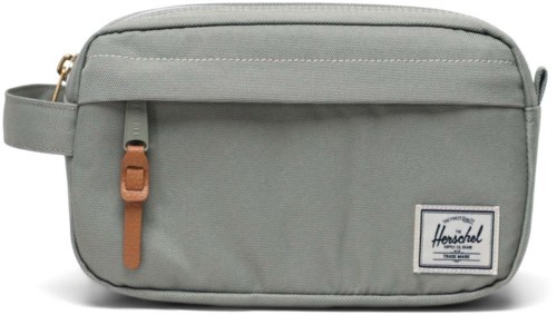 A light gray Herschel pouch with a front zipper pocket and a brown zipper pull.