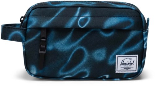 A dark blue Herschel bag with a shiny, swirling pattern and a white logo patch on the front.