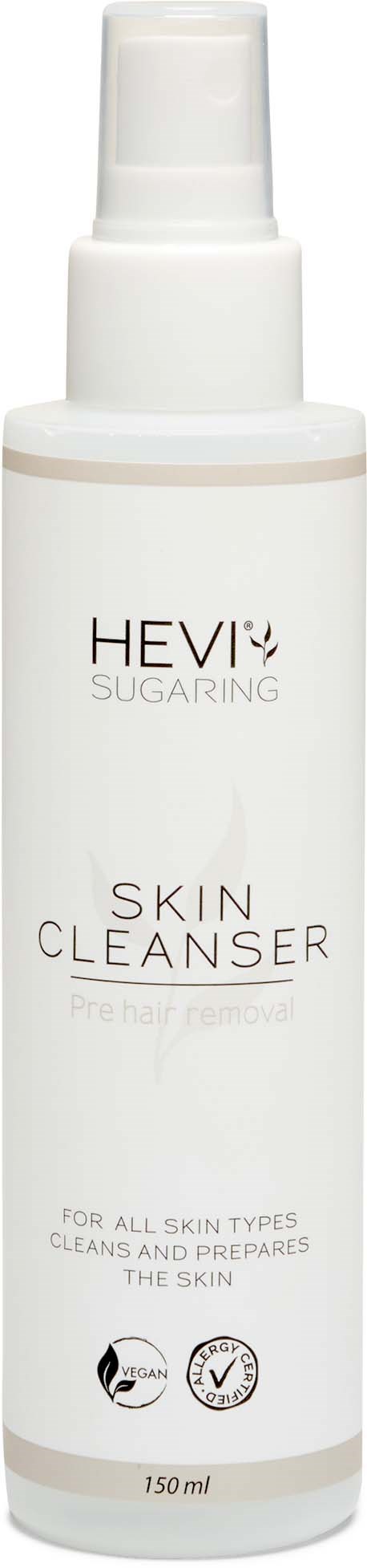 A white bottle with a spray top labeled 'Hevi SUGARING Skin Cleanser,' for all skin types, 150 ml.