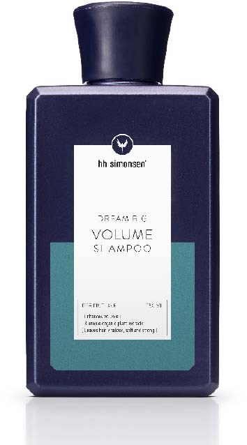 En mørk blå flaske med svart lokk, merket 'hb simonsen' og 'Volume Shampoo' i midten.