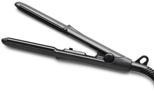 A flat iron with two heated plates used for styling hair.