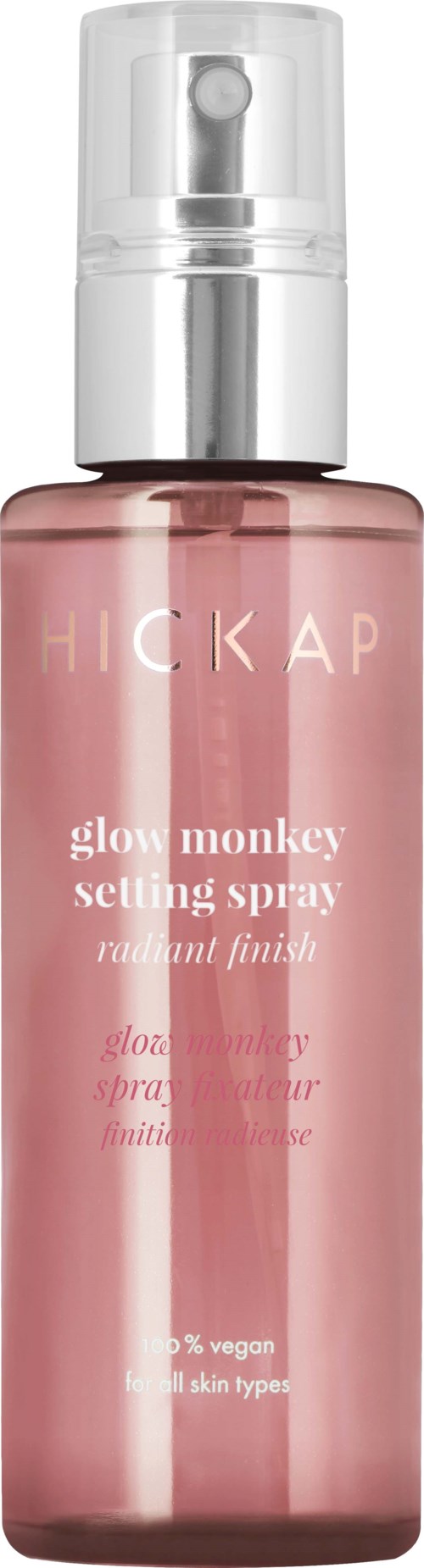 Pink sprayflaske merket 'HICKA' med sølvkappe og hvit spraymynte.