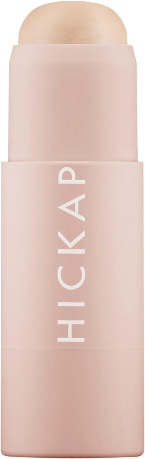 A pink makeup stick with a rounded top and the words 'HICKAP' on it.
