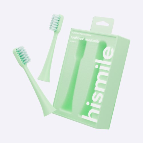 Two green toothbrush heads and a box of refill heads with the brand name 'hismile'.