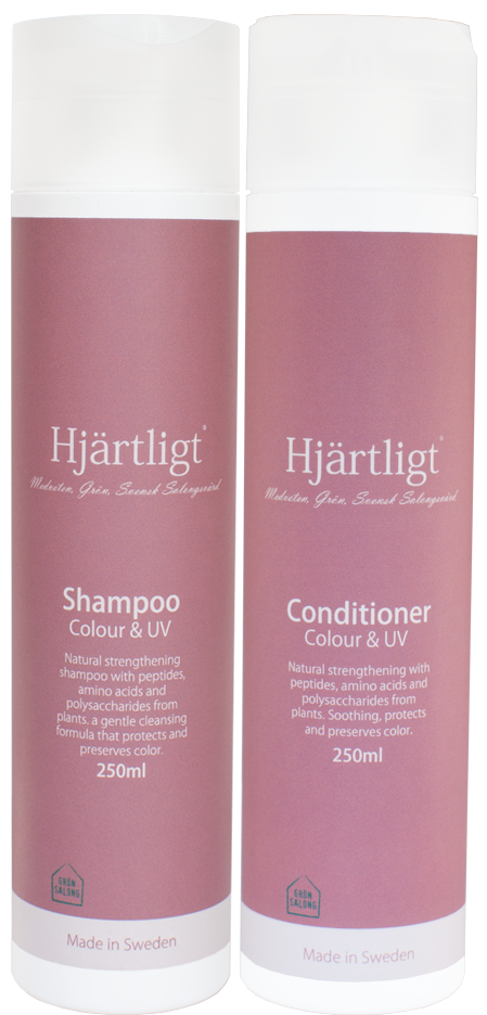 Två rosa flaskor märkta 'Schampo' och 'balsam' från Hjärtligt, vardera 250 ml, tillverkade i Sverige.