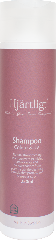 En rosa schampoflaska märkt Hjärtligt, innehåller 250 ml, tillverkad i Sverige, för färg och UV-skydd, med naturliga ingredienser.