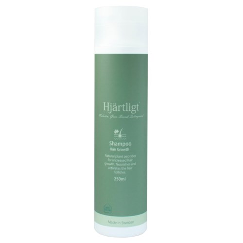 Vihreä ja valkoinen shampoopullo nimeltä 'Hjärtligt', joka edistää hiustenkasvua, Ruotsissa valmistettu, 250ml.