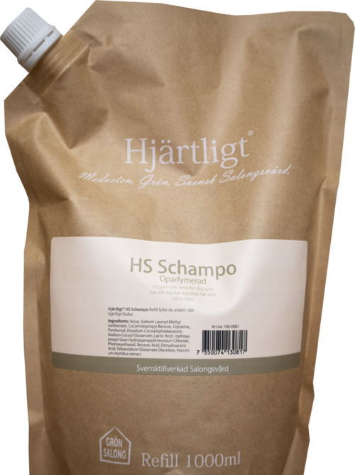 Eine braune Nachfülltasche mit weißem Etikett für herzfreundliches Shampoo, 1000 ml, mit Schraubverschluss.