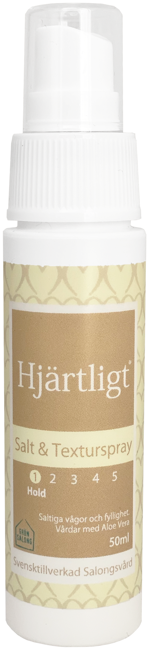 En lille hvid sprayflaske mærket 'Hjärtligt' med salt- og teksturspray til styling.