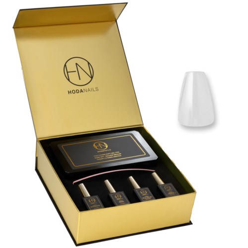 Eine goldene Schachtel enthält vier Nagellackflaschen und eine weiße Nagellampe zum Aushärten. Die Schachtel ist geöffnet und zeigt die Marke HODANAILS.