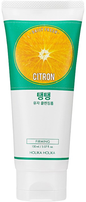 En tube med hudpleiekräm med et sitrusfruktbilde, merket 'Citron' og 'Firming', fra Holika Holika.