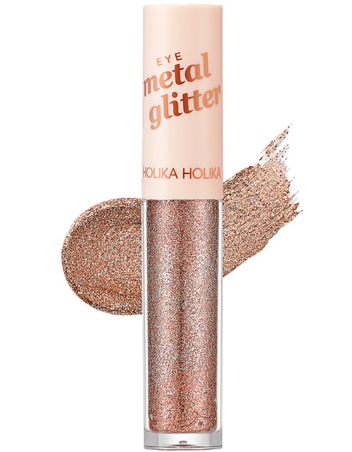 En tube med øjenmetalglitter med lys lyserødt låg, viser glitrende glitter inde i og en farveprøve ved siden.