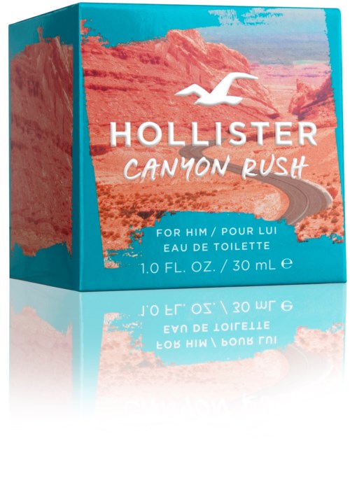 Turkusowe opakowanie perfum z krajobrazem kanionu, białym logo mewy i tekstem o Hollister Canyon Rush Eau de Toilette.