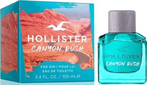 Zestaw perfum i butelka w kolorze pomarańczowym i niebieskim, z drogą i ptakiem, oznaczone 'Hollister Canyon Rush.'