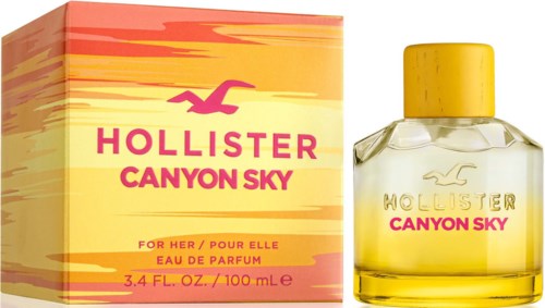 Butelka perfum i pudełko z różowymi, żółtymi, pomarańczowymi kolorami, oznaczone "Hollister Canyon Sky," dla kobiet.