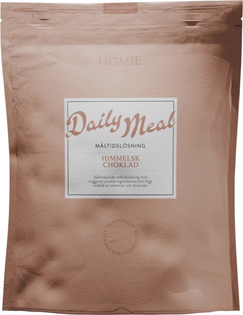 En rosa-brun påse med en etikett som säger "Daily Meal" och beskriver en chokladsmak.