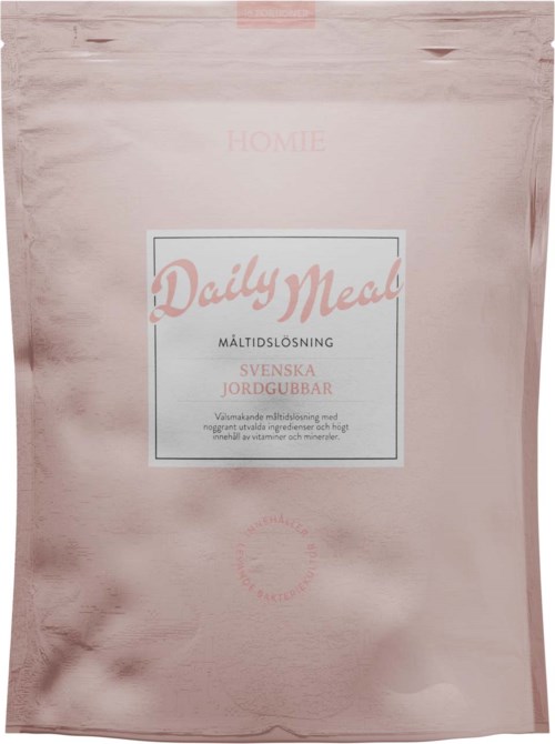 Eine rosa Verpackung mit einem Etikett, das 'Daily Meal' sagt und schwedische Erdbeeren erwähnt, legt den Fokus auf gesunde, natürliche Zutaten.