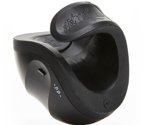 A black rubber ring for training dogs, with the words 'Hot Saltine' embossed on it.