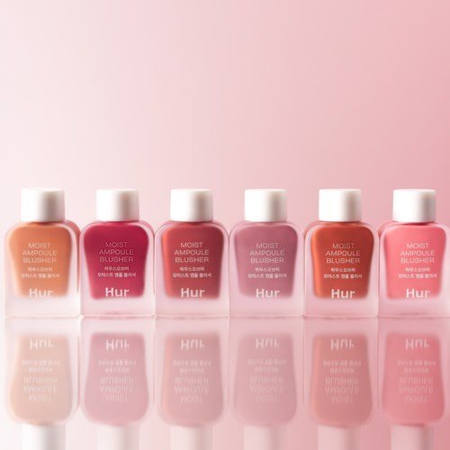 Six bottles of blush with different shades, from light to pink and peach, placed on a reflective surface.