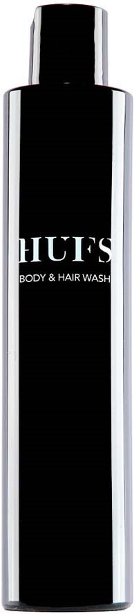 En lang svart flaske med sølvkanter, merket 'BODY & HAIR WASH'.