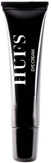 En sort tube mærket 'HUE'S EYE CREAM' stående oprejst.