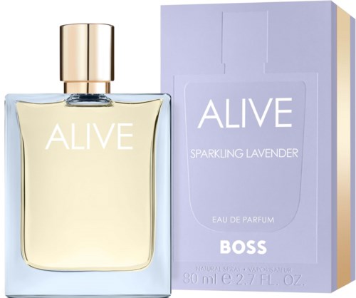 A perfume bottle labeled ALIVE next to a purple box with similar branding and scent details.