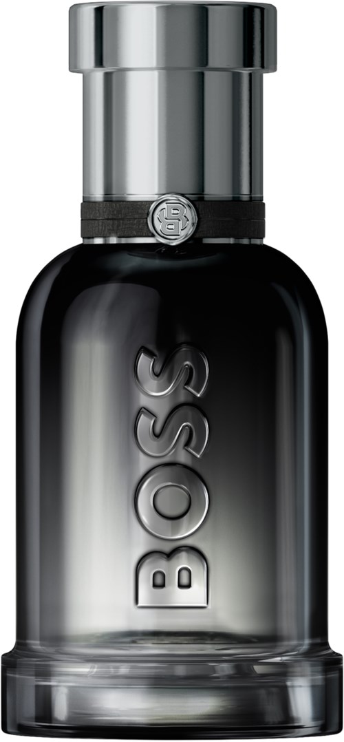 En svart och silver parfyllflaska med ordet 'BOSS' på, ser elegant och modern ut.