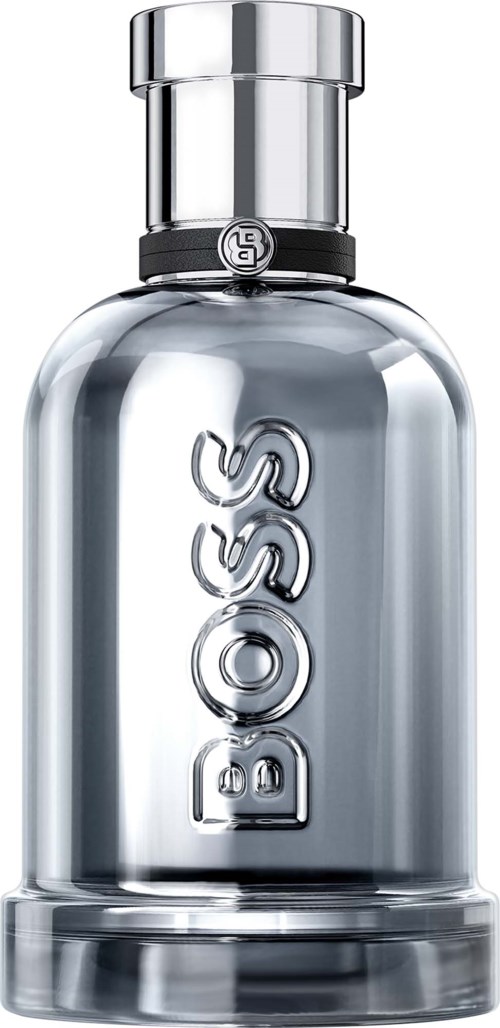 A clear glass perfume bottle with a silver cap and the BOSS logo embossed on the front.