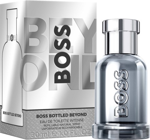 A bottle of Boss Bottled Beyond perfume next to its packaging with the Boss logo and product name.
