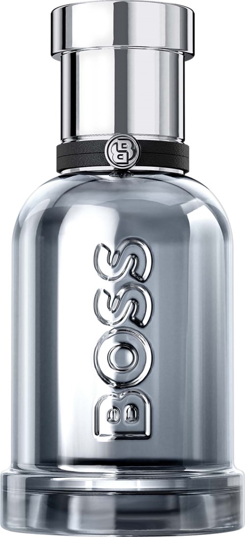 A tall, clear glass bottle with a silver cap and the BOSS logo on the front. Fragrance bottle for men.