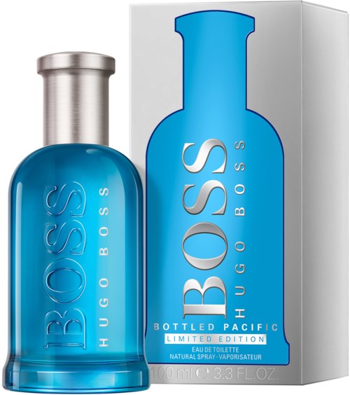 Blauwe parfumfles en doos met Hugo Boss-logo, gelabeld als 'Bottled Pacific' en 'Limited Edition.'