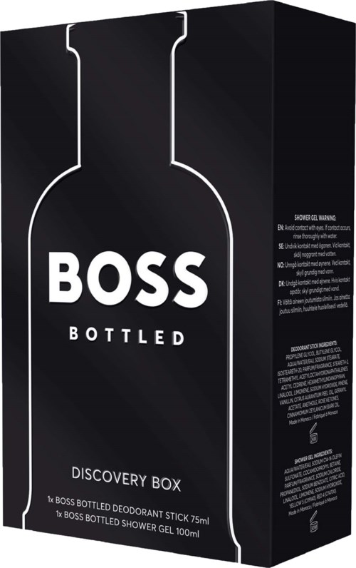 Czarne pudełko prezentowe z białym konturem symbolizującym butelkę, na którym znajdują się nazwy produktów Boss Bottled.