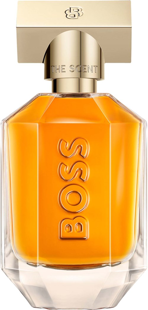 A perfume bottle with orange liquid, embossed BOSS logo, and a beige cap labeled The Scent.