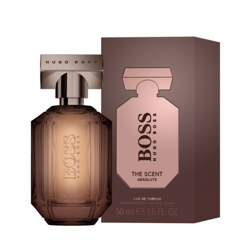 En glasparfymflaska med en rosa förpackning. Flaskan har en silverlock med 'Hugo Boss' skrivet på.