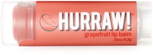 En läppbalsamrör märkt 'Hurraw! grapefrukt' med röd och vit design och en grapefruktsbild.