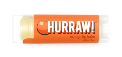 Oranje lipbalsem tube met "HURRAW!" tekst en glimlachend gezichtlogo.
