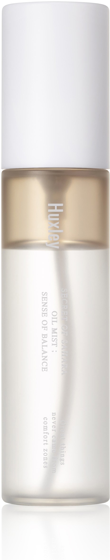 En genomskinlig behållare med vit och beige vätska inuti, står upprätt med vit lock. Det verkar vara en hudvårds- eller kosmetikprodukt.