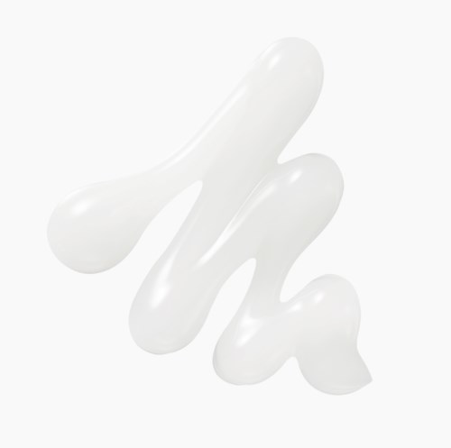 Witte crème of lotion in een spiraalvorm op een witte achtergrond.